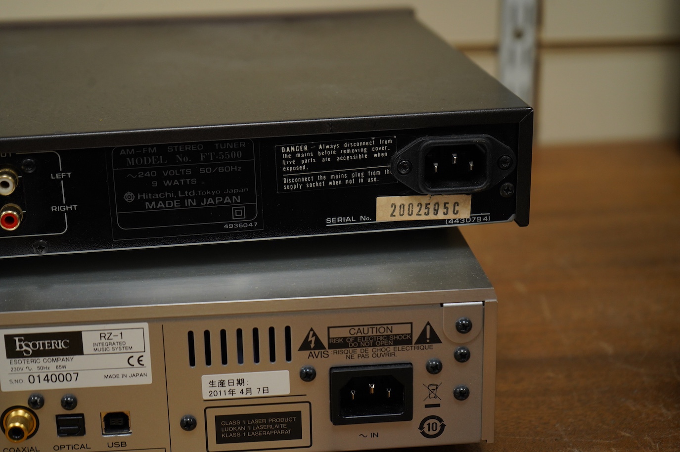 An Esoteric RZ-1 Integrated Music System, amplifier SACD/CD player, together with a Hitachi FT-5500 AM/FM stereo tuner, plus cables.